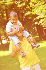 Image showing happy grandfather and child in park