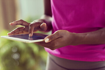 Image showing african american woman using tablet