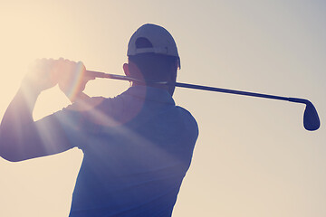 Image showing golf player hitting shot