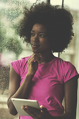 Image showing african american woman using tablet