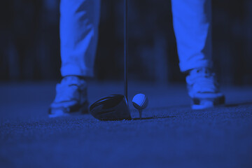 Image showing golf player hitting shot