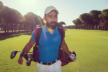 Image showing golf player walking