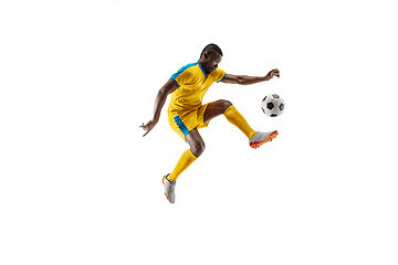 Image showing Professional african football soccer player isolated on white background