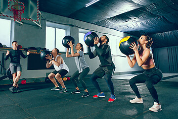 Image showing functional fitness workout at the gym with medicine ball