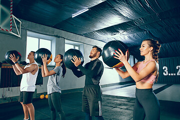 Image showing functional fitness workout at the gym with medicine ball