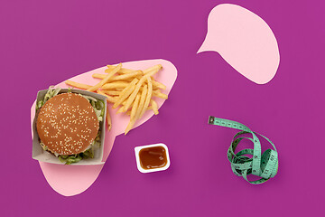 Image showing I love fast food. French fries in the form of is liver isolated on pink background