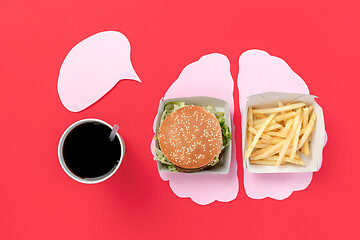 Image showing I love fast food. French fries in the form of brain isolated on red background