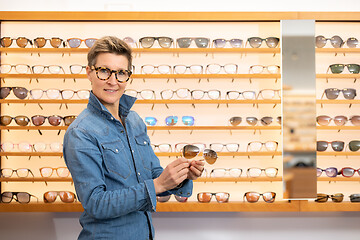 Image showing woman in a eyewear store