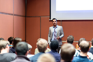 Image showing Business speaker giving a talk at business conference meeting event.