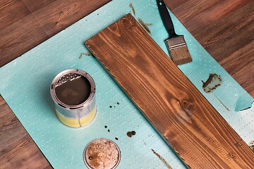 Image showing Painting wood lumber plank