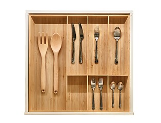 Image showing Minimalist kitchen tools put away in a drawer