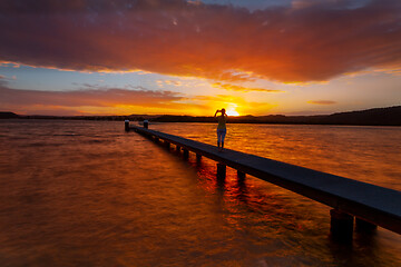 Image showing Taking photos of amazing sunsets from the jetty