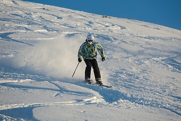 Image showing Skiing in fresh powder snow