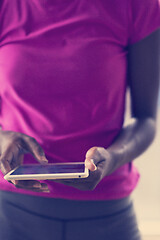 Image showing african american woman using tablet