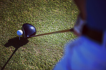 Image showing top view of golf club and ball in grass