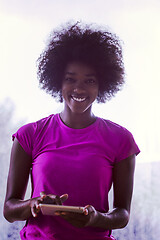 Image showing african american woman using tablet