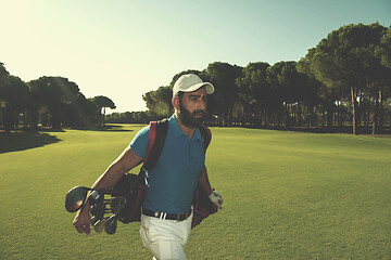 Image showing golf player walking