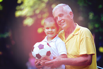 Image showing happy grandfather and child in park