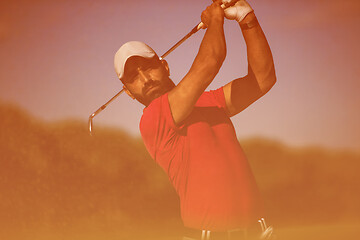 Image showing golfer hitting a sand bunker shot