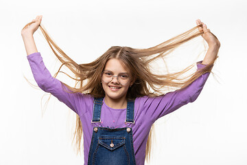 Image showing Portrait of a Girl with Strongly Tangled Hair