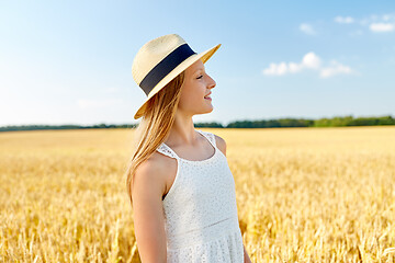 Image showing portrait of girl in straw hat on field in summer