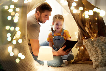 Image showing family with tablet pc in kids tent at home