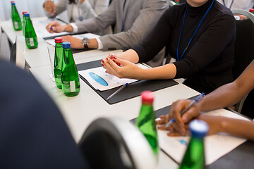 Image showing hands of businesswoman at business conference