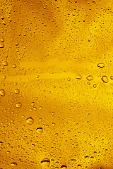 Image showing Close up view of cold drops on the glass of beer