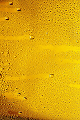 Image showing Close up view of cold drops on the glass of beer