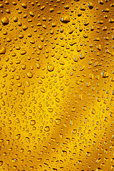 Image showing Close up view of cold drops on the glass of beer