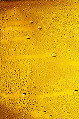 Image showing Close up view of cold drops on the glass of beer