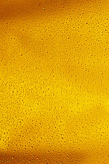 Image showing Close up view of cold drops on the glass of beer