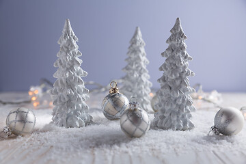 Image showing White trees with small Christmas balls as snowy landscape