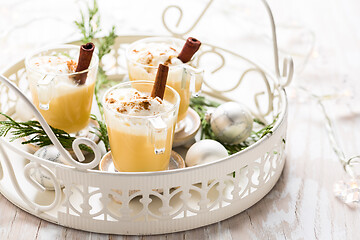 Image showing Eggnog with cinnamon and nutmeg for Christmas and winter holidays.