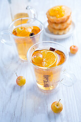 Image showing Apple cider cocktail with cinnamon and small lemon curd tarts