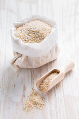 Image showing Heap of psyllium husk in small bag