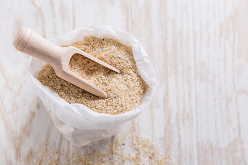 Image showing Heap of psyllium husk in small bag