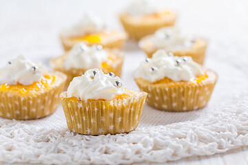 Image showing Homemade lemon curd cupcakes with whipped cream