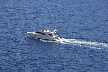 Image showing A group of  people sail on luxury motor boat