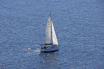 Image showing Small Sailing boat yacht in the open blue Sea