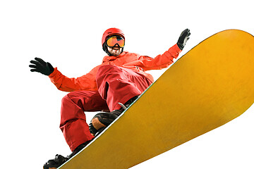 Image showing Portrait of young man in sportswear with snowboard isolated on a white background.