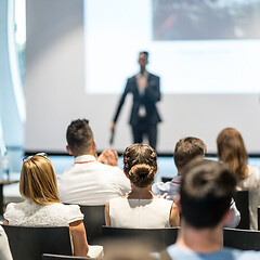 Image showing Male business speaker giving a talk at business conference event.