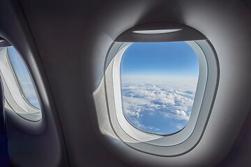 Image showing Flying on airplane widow seat, clouds view