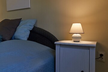 Image showing Lamp on a nightstand