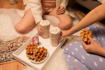 Image showing women drinking hot chocolate and eating waffles