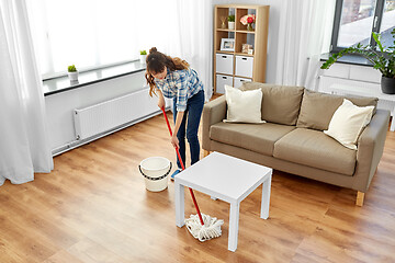 Image showing woman or housewife with mop cleaning floor at home