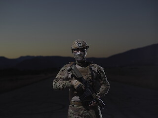 Image showing soldier with full combat gear in night mission