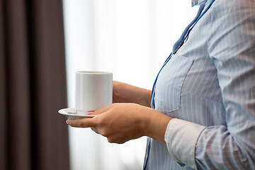 Image showing close up of woman drinking coffee