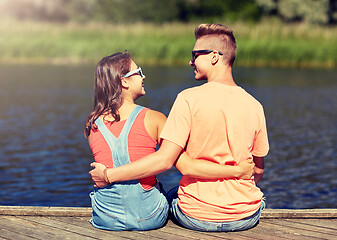 Image showing happy teenage couple hugging on river summer berth