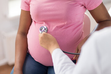 Image showing gynecologist doctor and pregnant woman at hospital